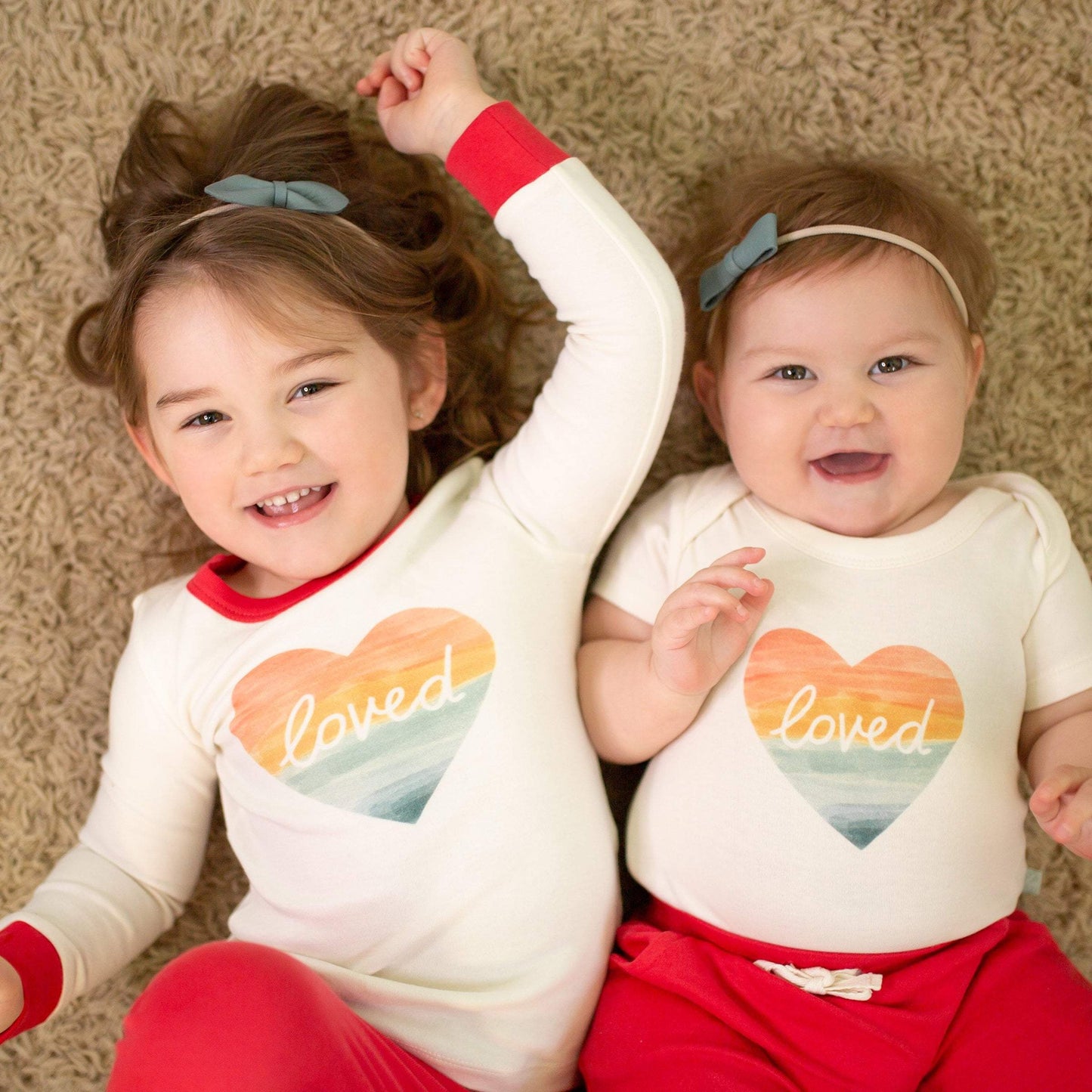 Baby graphic bodysuit | loved rainbow heart finn + emma