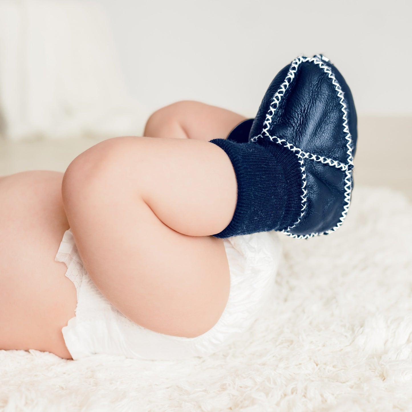 Baby cozy booties | navy Finn + Emma