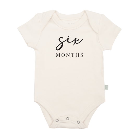 Baby graphic bodysuit | six months milestone black finn + emma